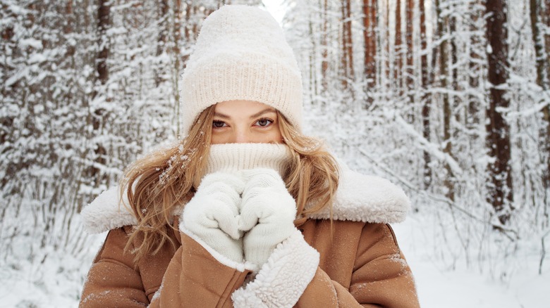 Girl dressed for cold weater.