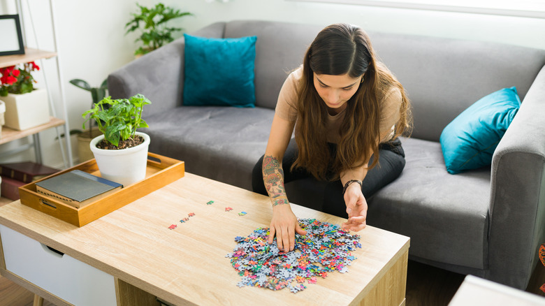 Woman starting a puzzle
