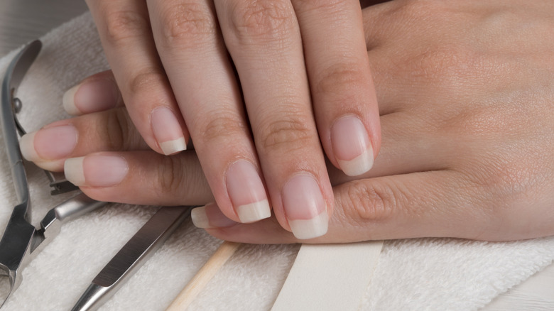 Hands with long natural nails