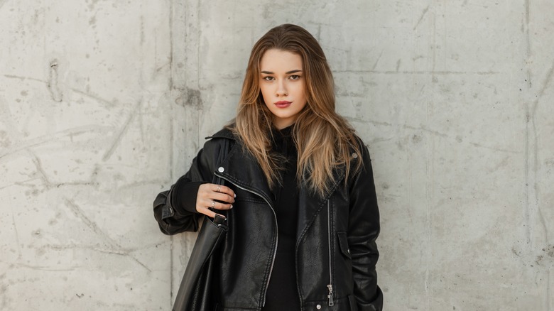 woman in leather jacket