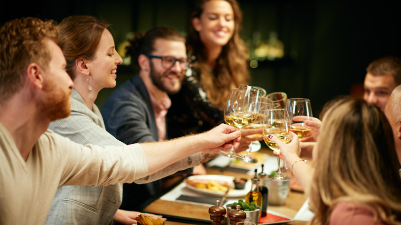 Friends gather for dinner 