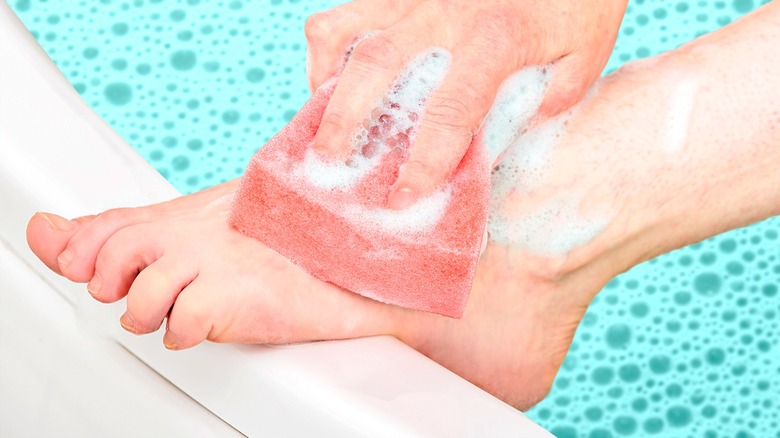 woman scrubbing feet