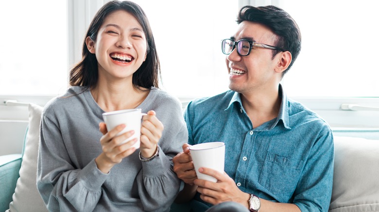 Couple laughs together