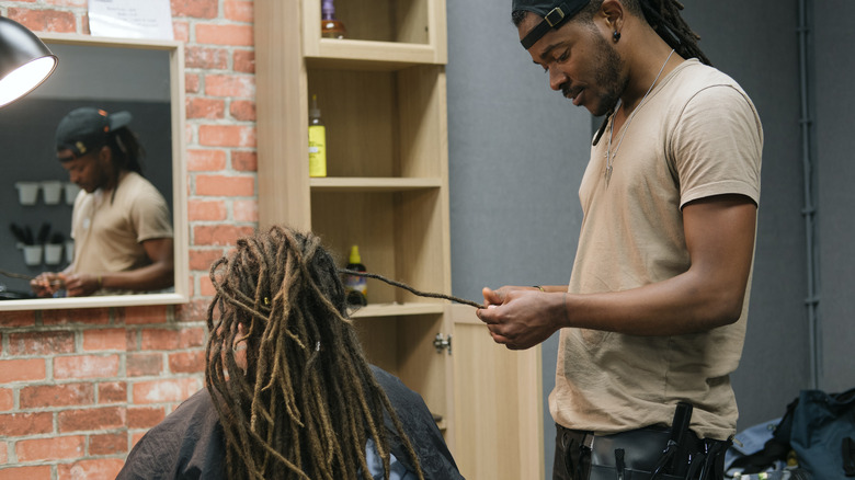 Hairstylist doing a women's hair
