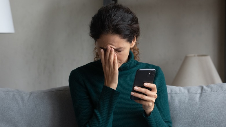 Woman frustrated phone