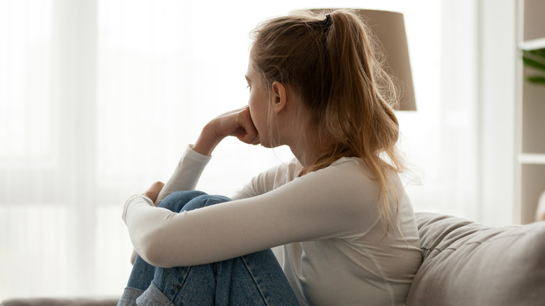 woman looking sad