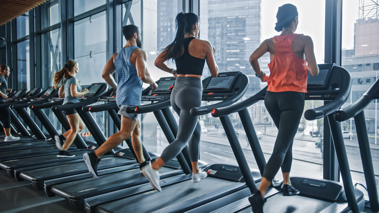People on treadmills at gym