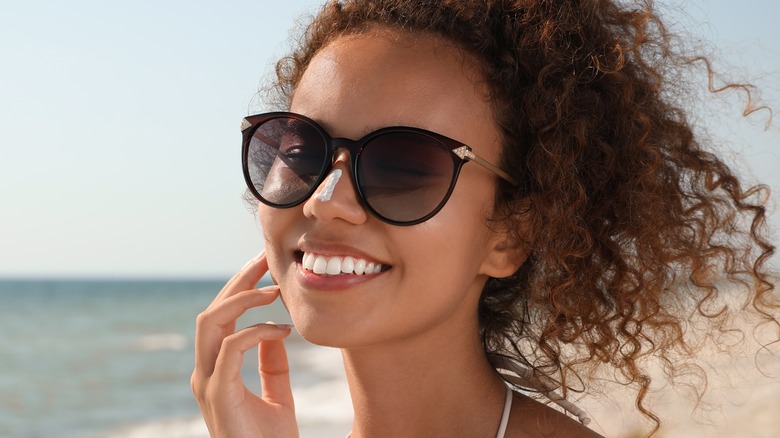 Woman wearing sunscreen