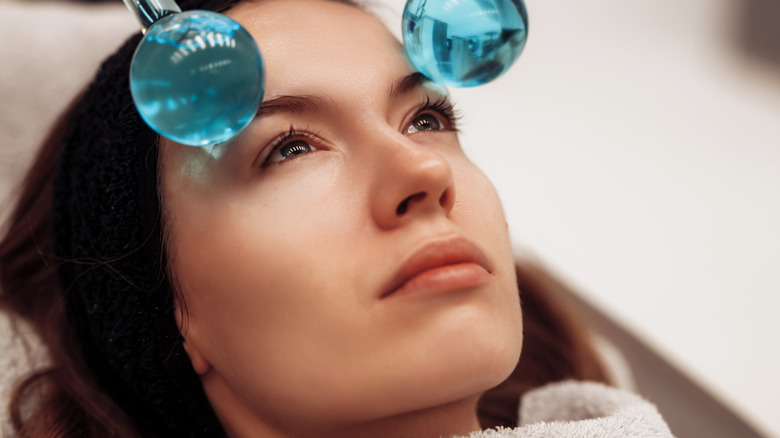 woman using ice rollers