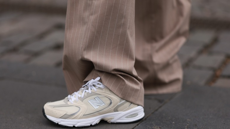 Pinstriped pants with sneakers