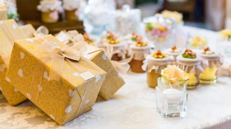 bride holding wedding gifts