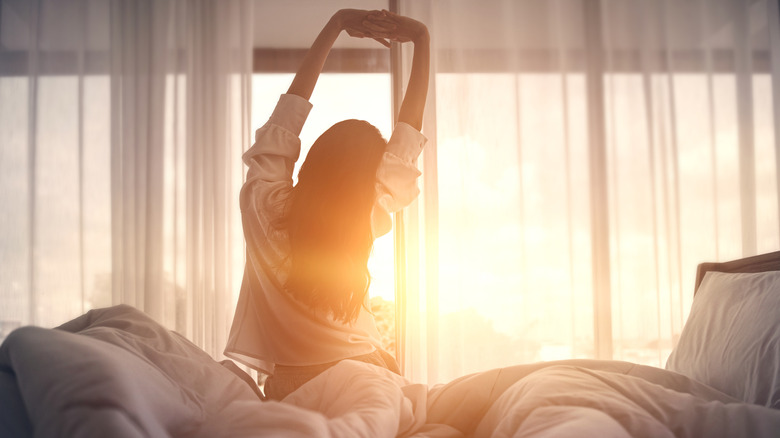 woman stretching in morning
