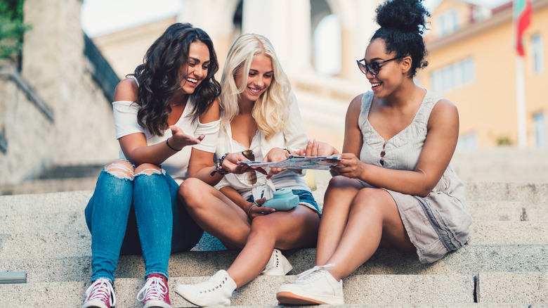 Friends sitting on stairs