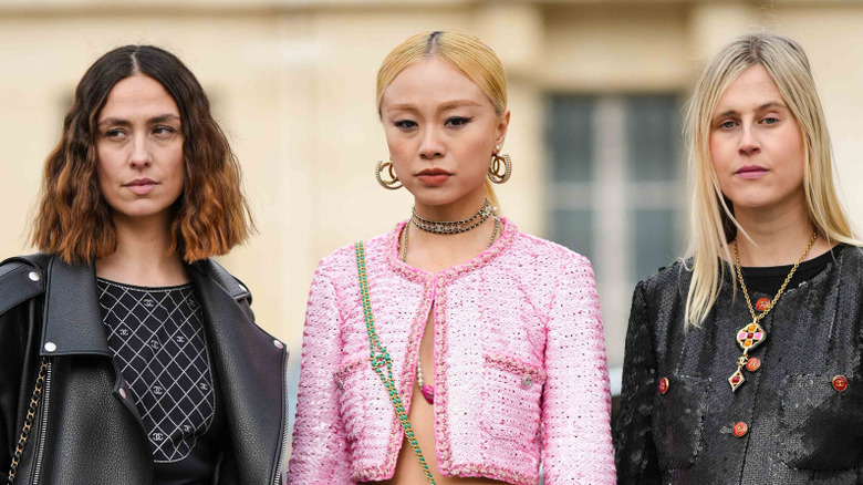 Three people in different hair cut lengths and styles