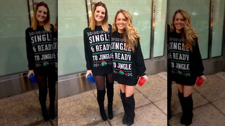 Tricia McLaughlin wearing a Christmas sweater and over-the-knee boots