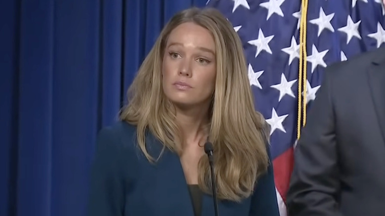 Tricia McLaughlin address a crowd of press