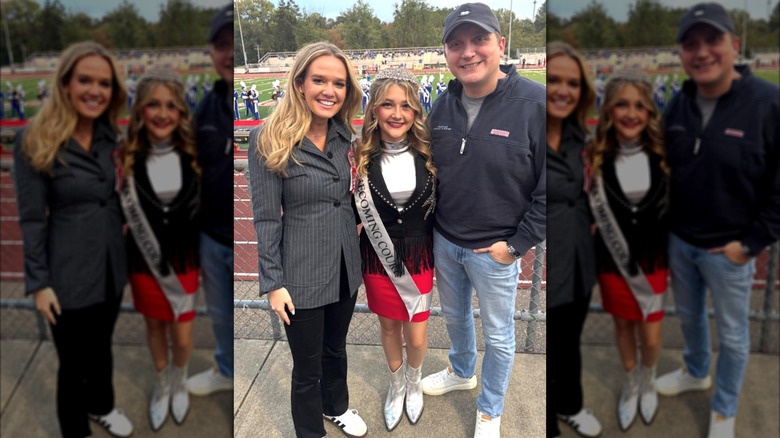 Tricia McLaughlin and fiance flank high schooler during homecoming game