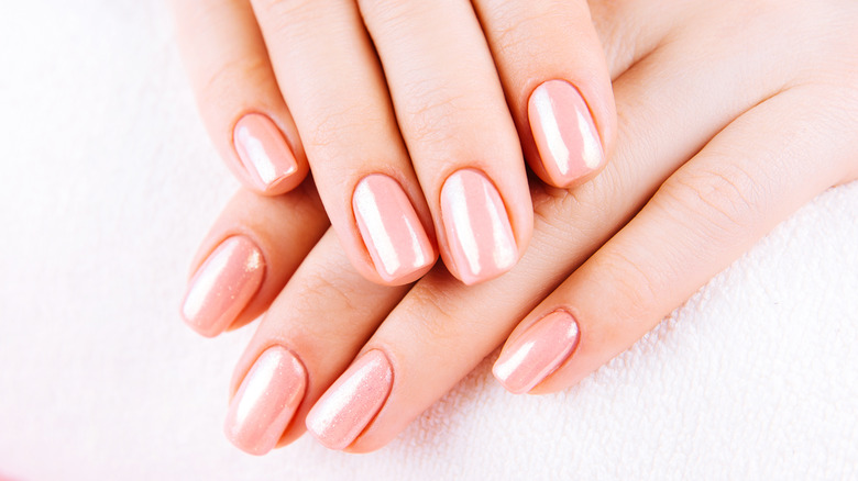 woman with rounded nails 