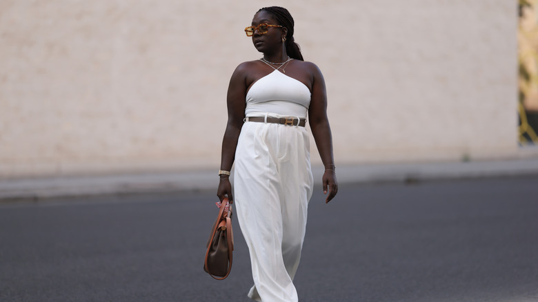 woman in white halter top