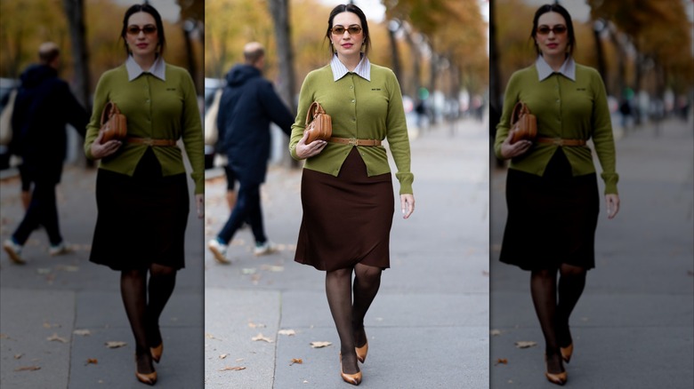 A woman wearing a chartreuse sweater