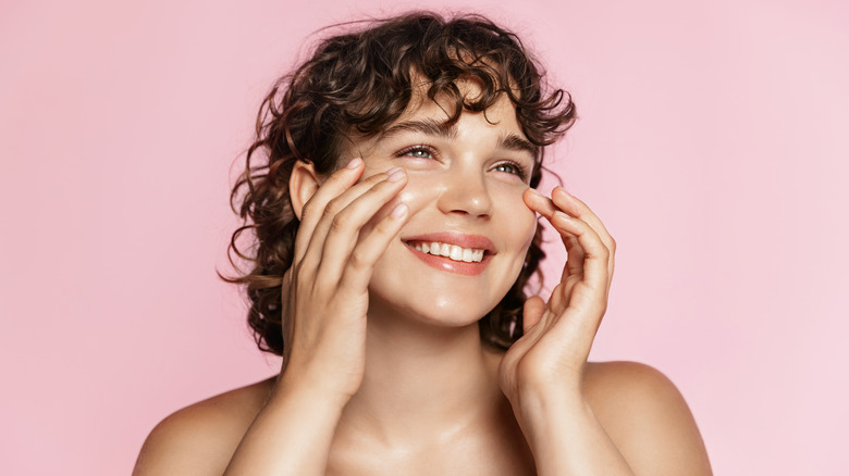 Woman with short curly hair