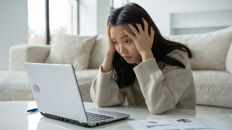 Woman looking overwhelmed