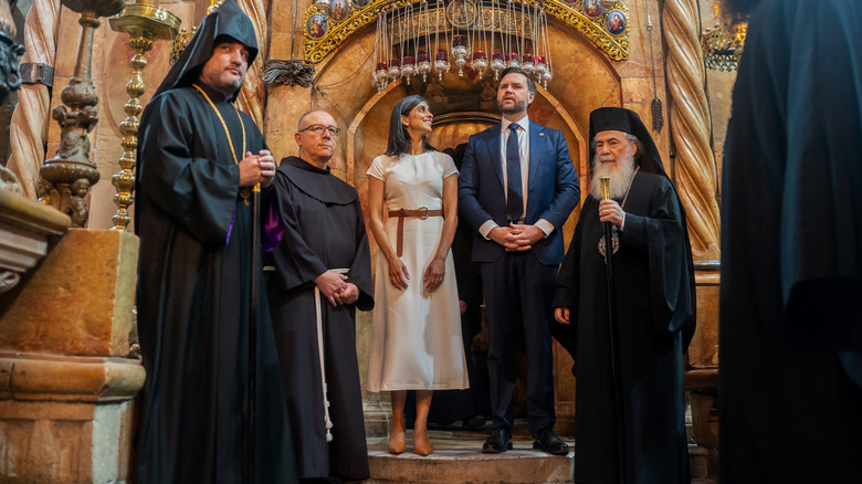 The Vances in a church in Jerusalem, with Usha wearing white