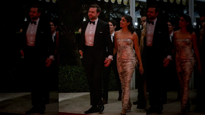 Usha Vance wearing a snakeskin dress with JD Vance next to her