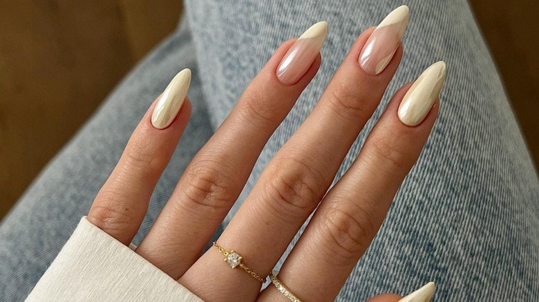 fingers with vanilla chrome manicure