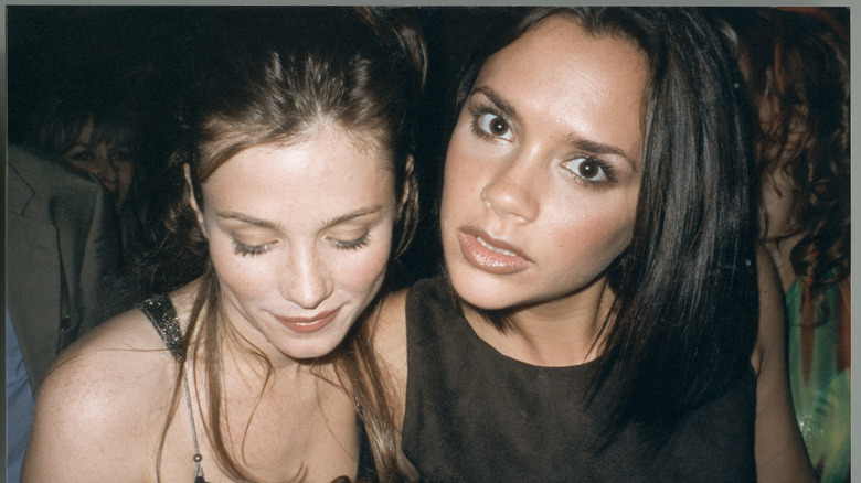 Victoria Beckham posing with Anna Friel in 1995
