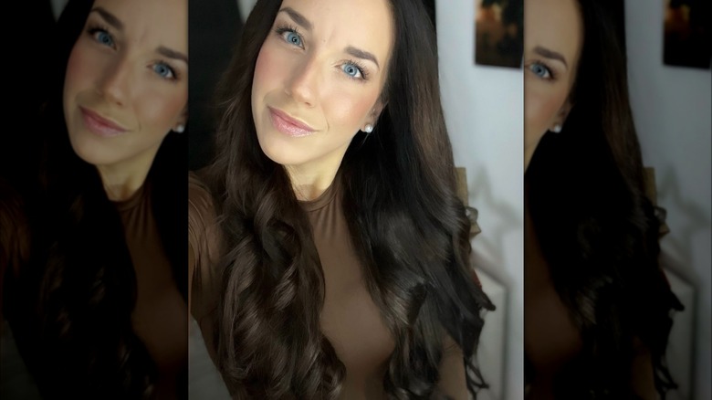 Woman with brown hair and blue eyes