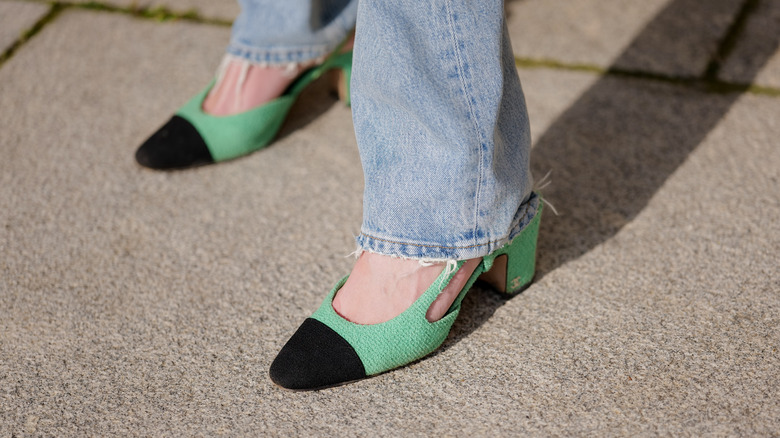green and black sling-backs with jeans