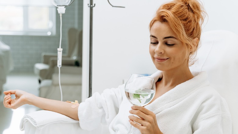 woman receiving IV infusion