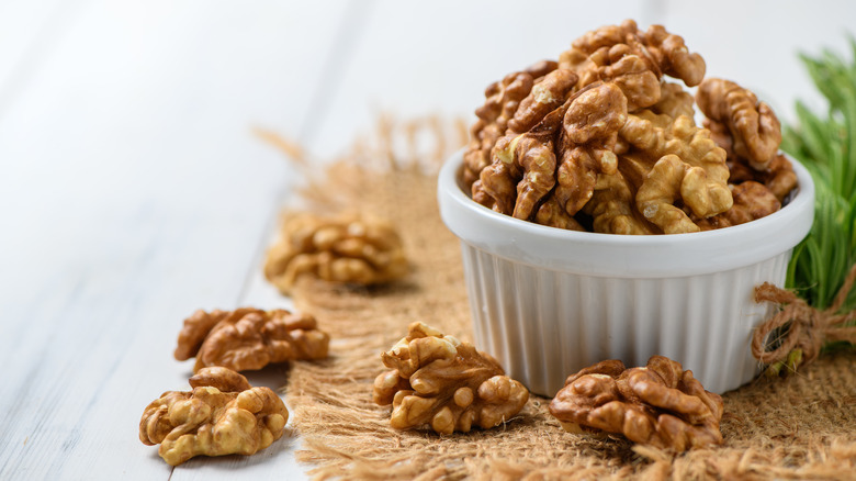 walnuts in a white cup 
