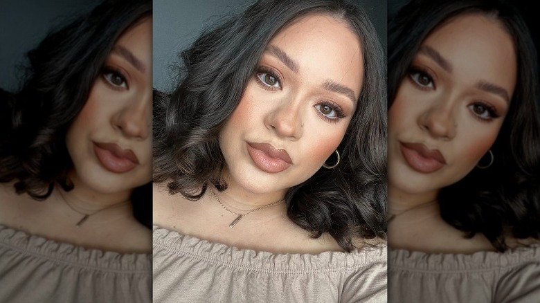 Brown smokey eyeliner with white waterline