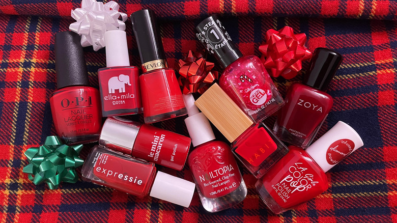 Assorted holiday red nail polishes