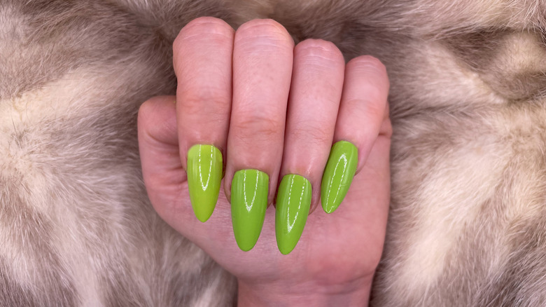 Hand model showing Cirque Colors Matcha polish