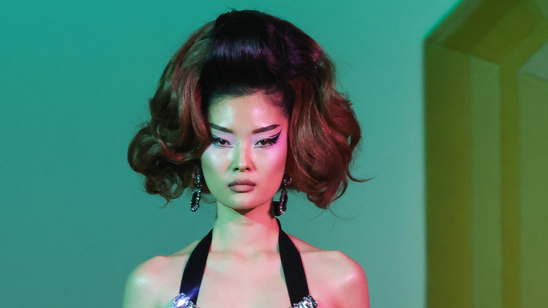 model with exaggerated bouffant