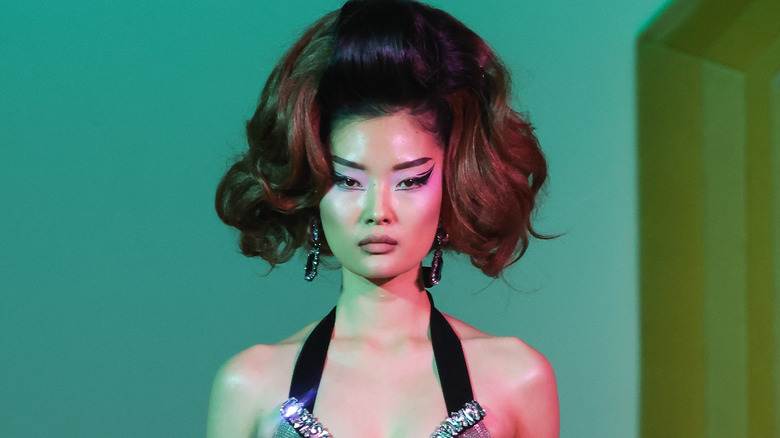 model with exaggerated bouffant