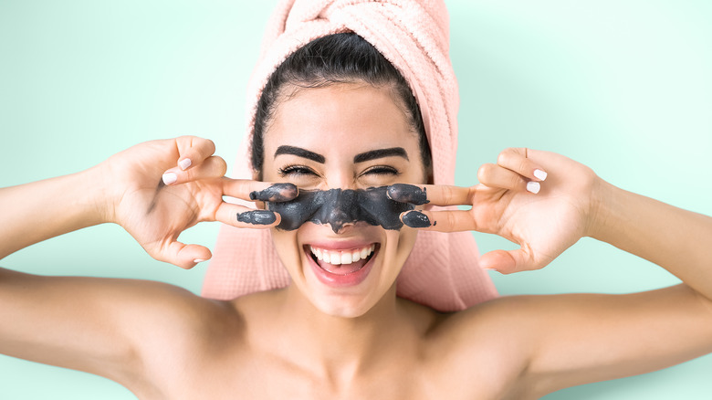 woman wearing clay mask