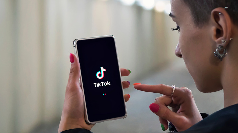 girl opening tiktok app