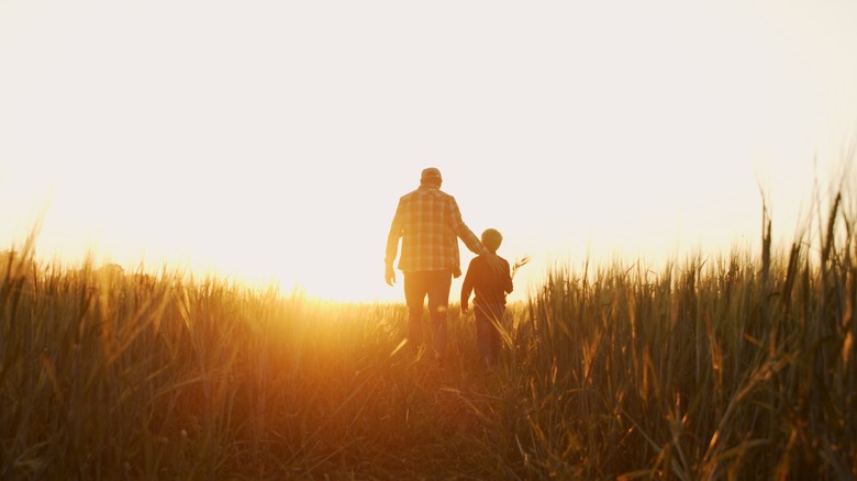 man and child in nature