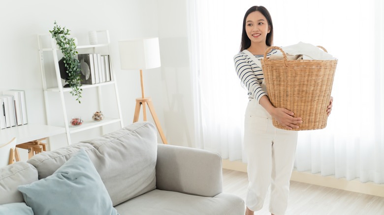 woman holding wicker basket