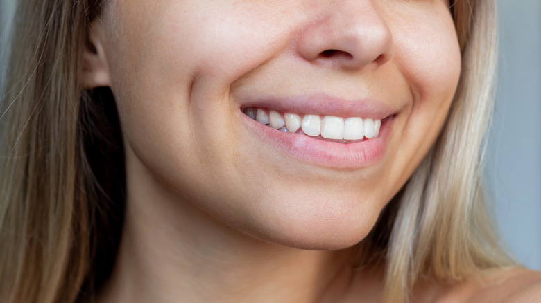 Smiling woman with cheek dimples