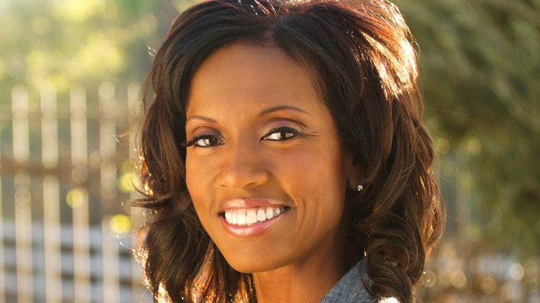 Black woman smiling outside