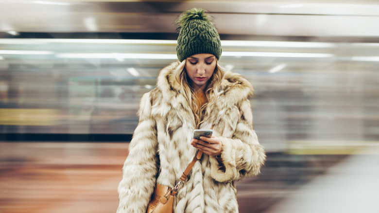 woman looking at phone