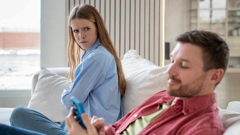 Angry woman staring at partner