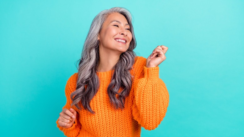 Woman with gray hair smiling