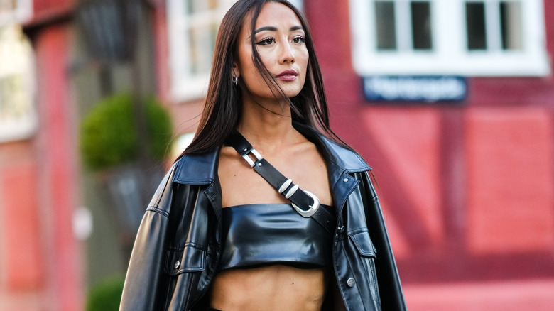 model walking black leather