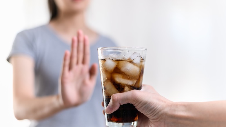 Woman rejects sugary soda